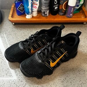 Nike Black and Gold Athletic Vapormax
